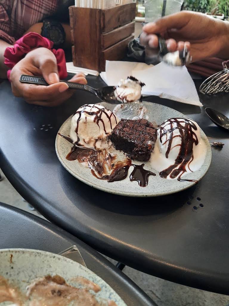 Brownie and ice cream dessert at The Big Oowl Cafe