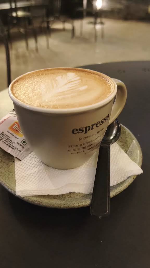 A cappuccino served at The Big Oowl Cafe
